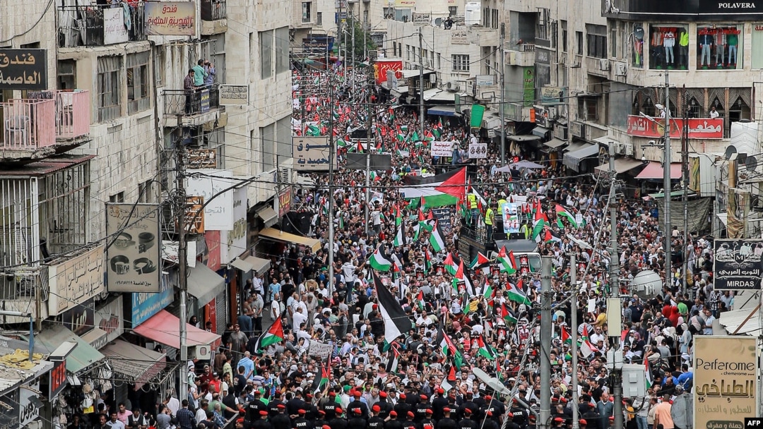 FILE - Members of Jordan's Darak forces (gendarmerie) stand on guard as protesters gather for a rally in solidarity with Palestinians in the Gaza Strip in Amman on Oct. 27, 2023. 