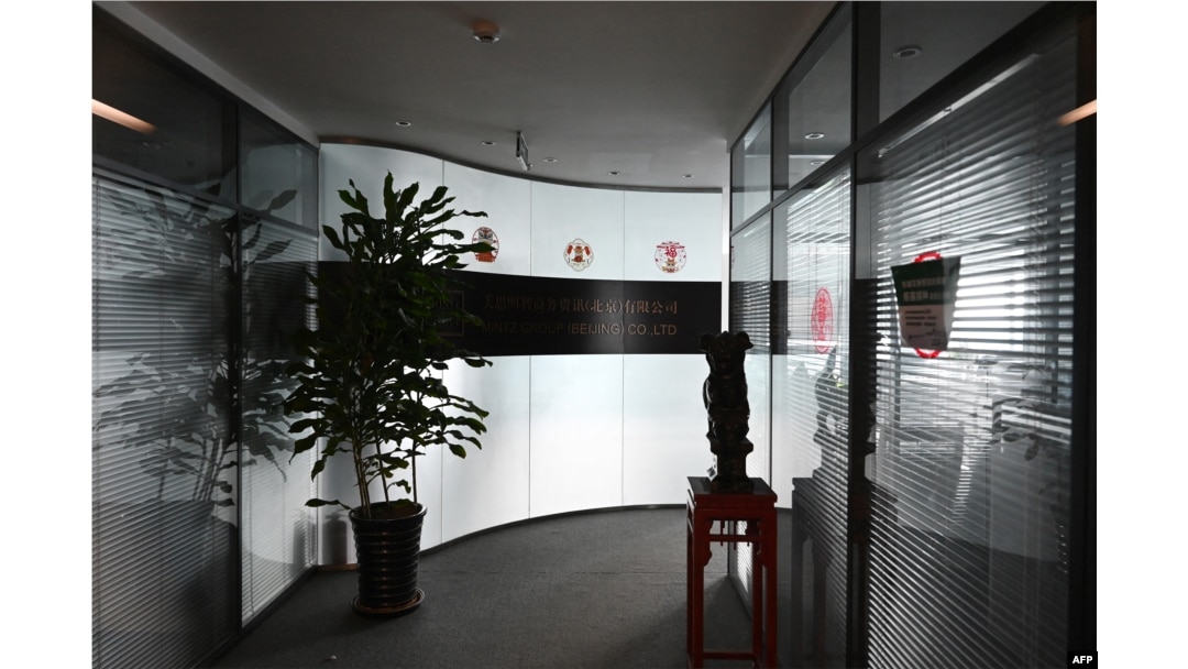 The closed office of the Mintz Group is seen in an office building in Beijing on March 24, 2023.