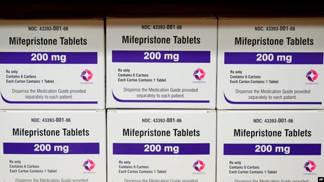 FILE - Boxes of the drug mifepristone sit on a shelf at the West Alabama Women's Center in Tuscaloosa, Ala., on March 16, 2022.