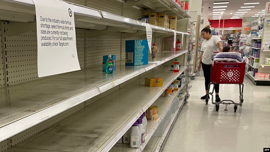 A woman shops for baby formula at Target in Annapolis, Maryland, on May 16, 2022, as a nationwide shortage of baby formula continues.