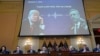A video presentation plays as the House select committee investigating the Jan. 6 attack on the U.S. Capitol holds its final meeting on Capitol Hill in Washington, Dec. 19, 2022. 