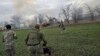 Ukrainian artillery unit members fire at Russian positions towards Kherson city, Oct. 28, 2022, in Ukraine's now Russia-annexed Kherson region.
