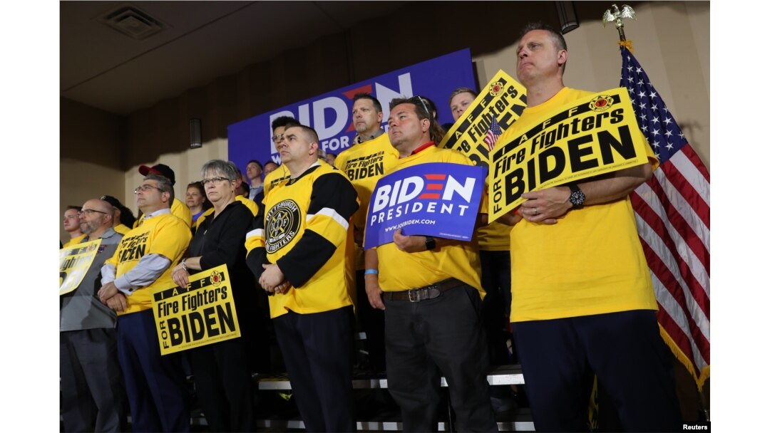 Union supporters stand behind U.S. Democratic presidential candidate and former Vice President Joe Biden as he addresses workers at the Teamsters Local 249 hall during his first public event since announcing his bid for the 2020 Democratic presidential nomination in Pittsburgh, Pennsylvania, April 29, 2019.
