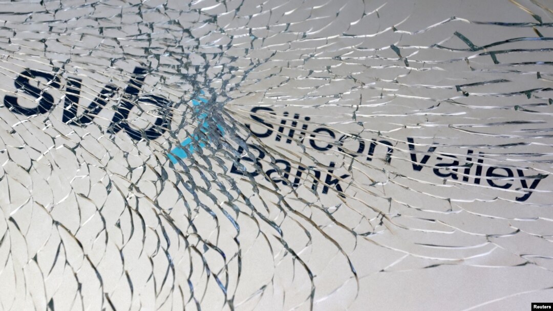 FILE - SVB (Silicon Valley Bank) logo is seen through broken glass in this illustration taken March 10, 2023.