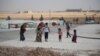 At the Ain Issa camp, Aug. 17, 2017, in northeastern Syria, some men say they left their families behind as they fled forced conscription by Islamic State militants. (H.Murdock/VOA)