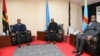 Presidentes João Lourenço, de Angola (esq), Paul Kagame, do Ruanda (cen) e Felix Tshisekedi, da RDC, Luanda, 21 Fevereiro 2020