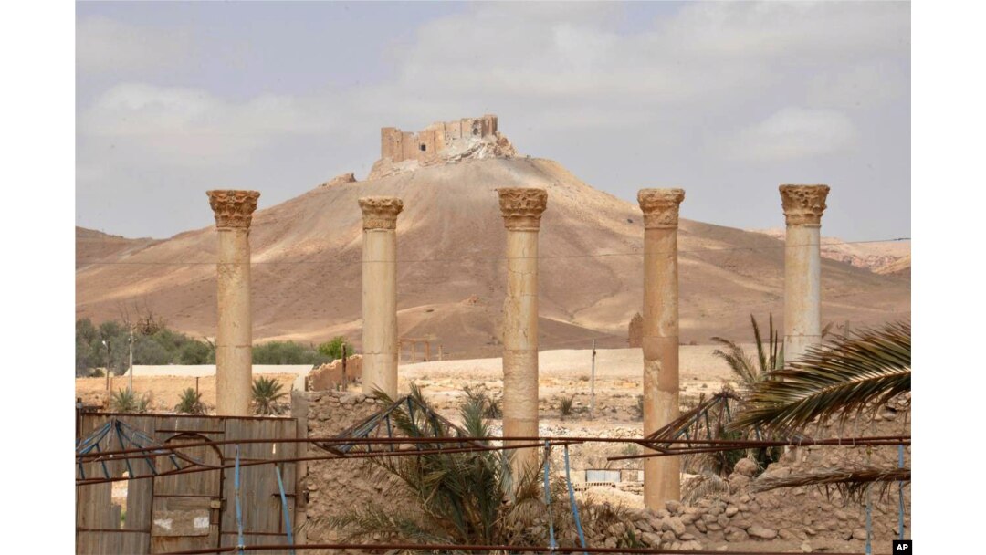 This photo released on Sunday March 27, 2016, by the Syrian official news agency SANA, shows a general view of Palmyra citadel, central Syria.
