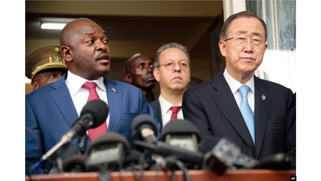 FILE - U.N. Secretary General Ban Ki-moon, right, listens as Burundi's President Pierre Nkurunziza speaks during a joint press conference in Bujumbura, Burundi, Feb. 23, 2016.