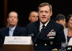 FILE - Adm. Michael Rogers, National Security Agency Director and chief of the Defense Department’s Cyber Command, testifies on Capitol Hill in Washington, Feb. 9, 2016.