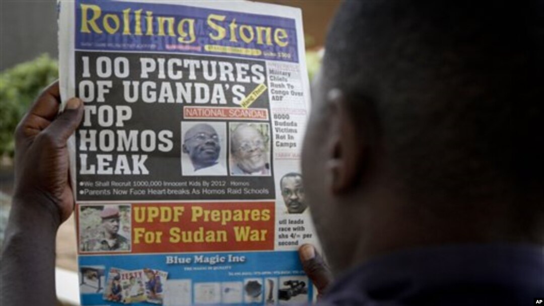A Ugandan man reads the headline of the Ugandan newspaper 'Rolling Stone' in Kampala, Uganda, 19 Oct 2010