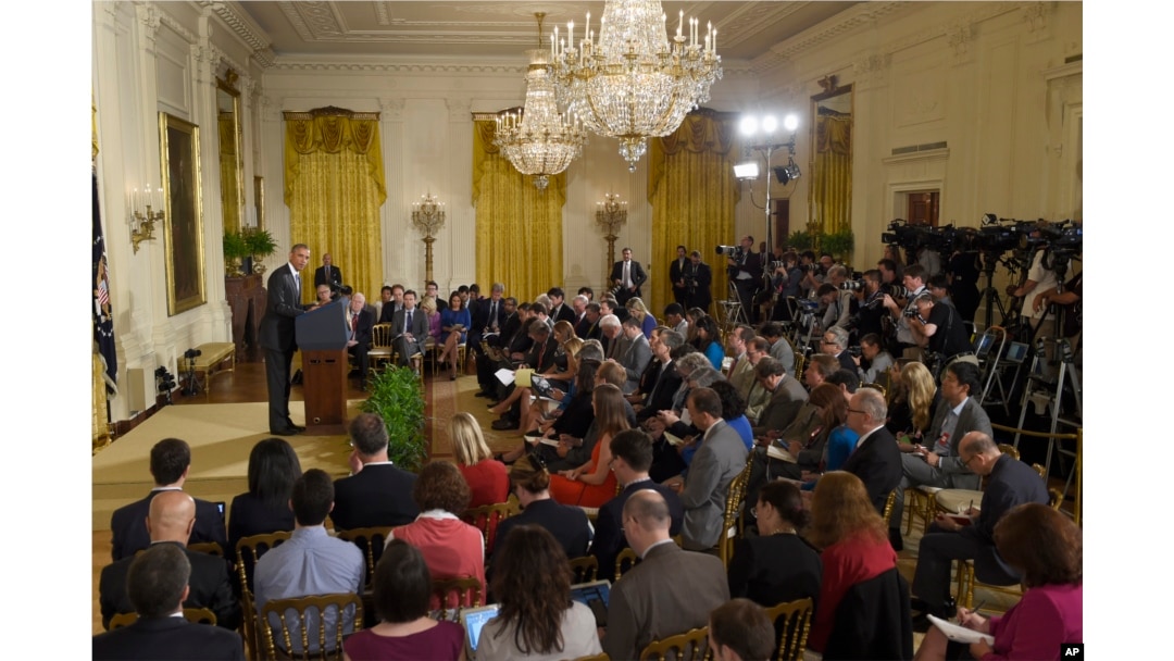 President Barack Obama makes opening remarks during news conference in the East Room of the White House, Washington, July 15, 2015.