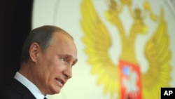  Russia's President Vladimir Putin addresses Russian Ambassadors during their meeting in the Foreign Ministry, in Moscow, July 9, 2012. 