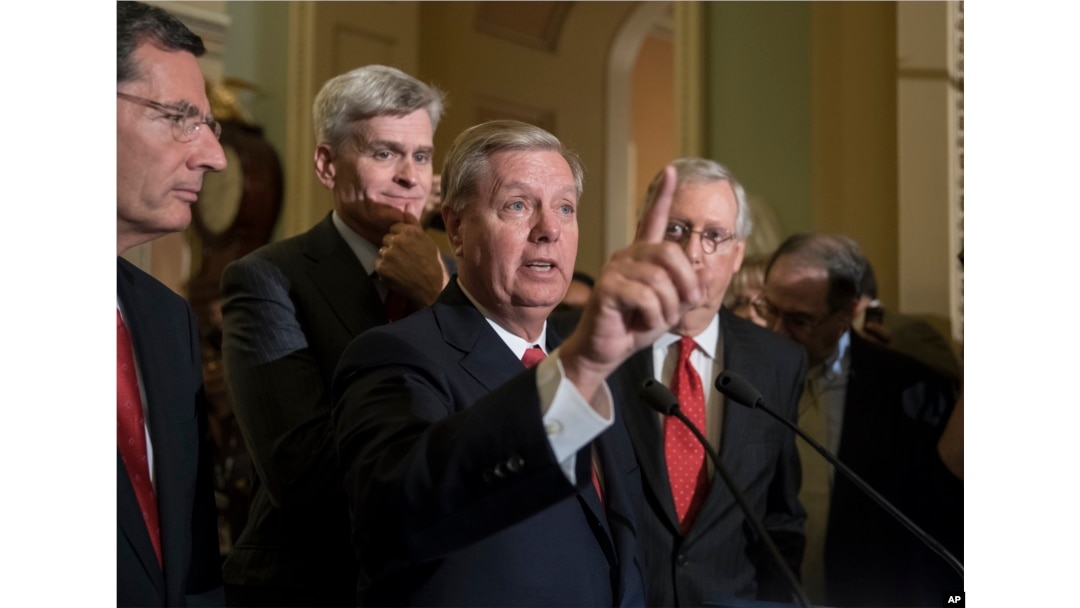 Sen. Lindsey Graham, R-S.C., joined by, from left, Sen. John Barrasso, R-Wyo., Sen. Bill Cassidy, R-La., and Senate Majority Leader Mitch McConnell, R-Ky., speaks to reporters as they faced assured defeat on the Graham-Cassidy bill, the GOP's latest attempt to repeal the Affordable Care Act.