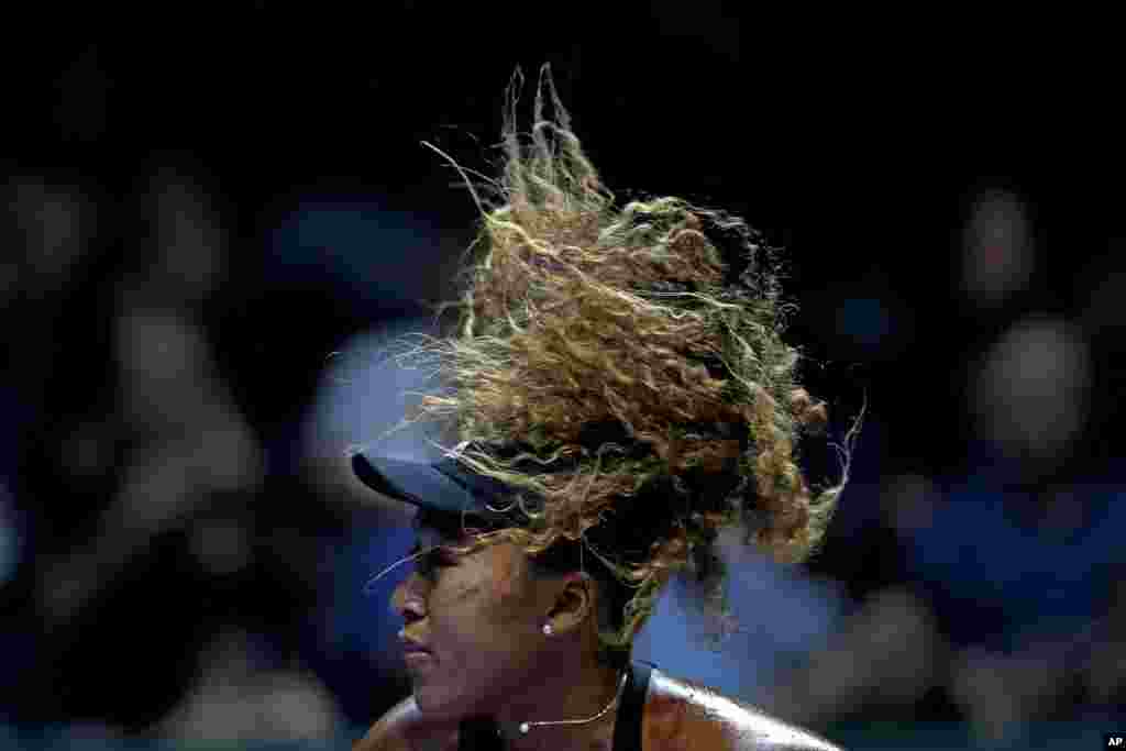 Naomi Osaka of Japan watches her return to Sloane Stephens of the United States during their women's singles match at the WTA tennis tournament in Singapore.