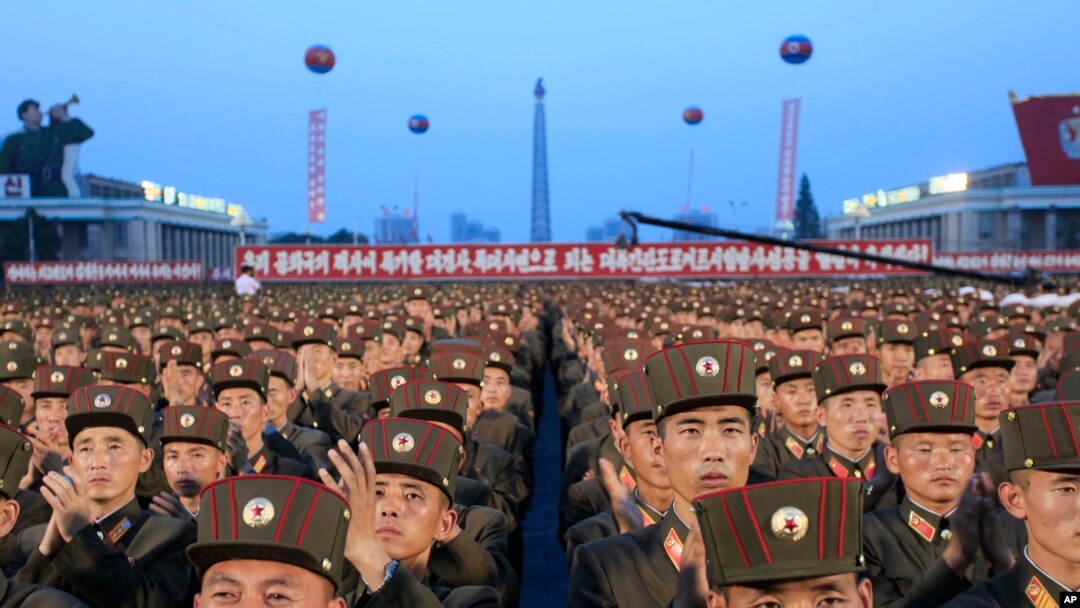 FILE - Soldiers gather in Kim Il Sung Square in Pyongyang, North Korea, July 6, 2017, to celebrate the test launch of North Korea's first intercontinental ballistic missile two days earlier.