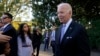 President Joe Biden talks with reporters on the South Lawn of the White House in Washington on Nov. 8, 2021.