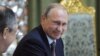 Putin Defends Russian Military Aid to Syria