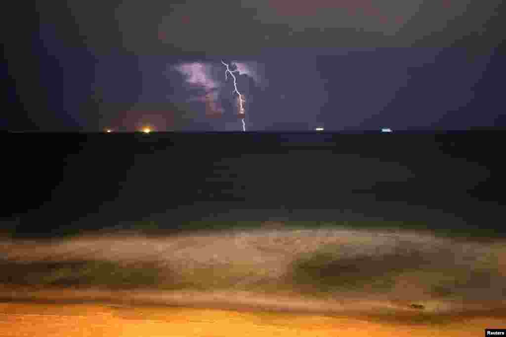 Lightning strikes over the Mediterranean sea during a rain storm near the city of Ashkelon, Israel Nov. 14, 2018.