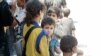 Authorities say children and wives of IS fighters are considered civilians, but other families often shun them. (H.Murdock/VOA)
