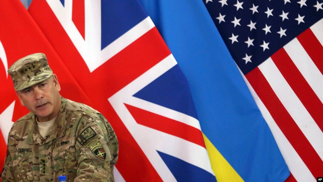 Commander of the International Security Assistance Force (ISAF), Gen. John Campbell, speaks during a ceremony at the ISAF headquarters in Kabul, Afghanistan, Dec. 28, 2014.