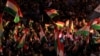 Kurds celebrate in support of the independence referendum in Duhok, Iraq, Sept. 26, 2017. 