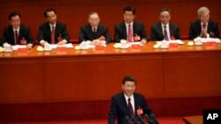 Chinese President Xi Jinping delivers a speech during the opening session of China's 19th Party Congress at the Great Hall of the People in Beijing, Wednesday, Oct. 18, 2017.