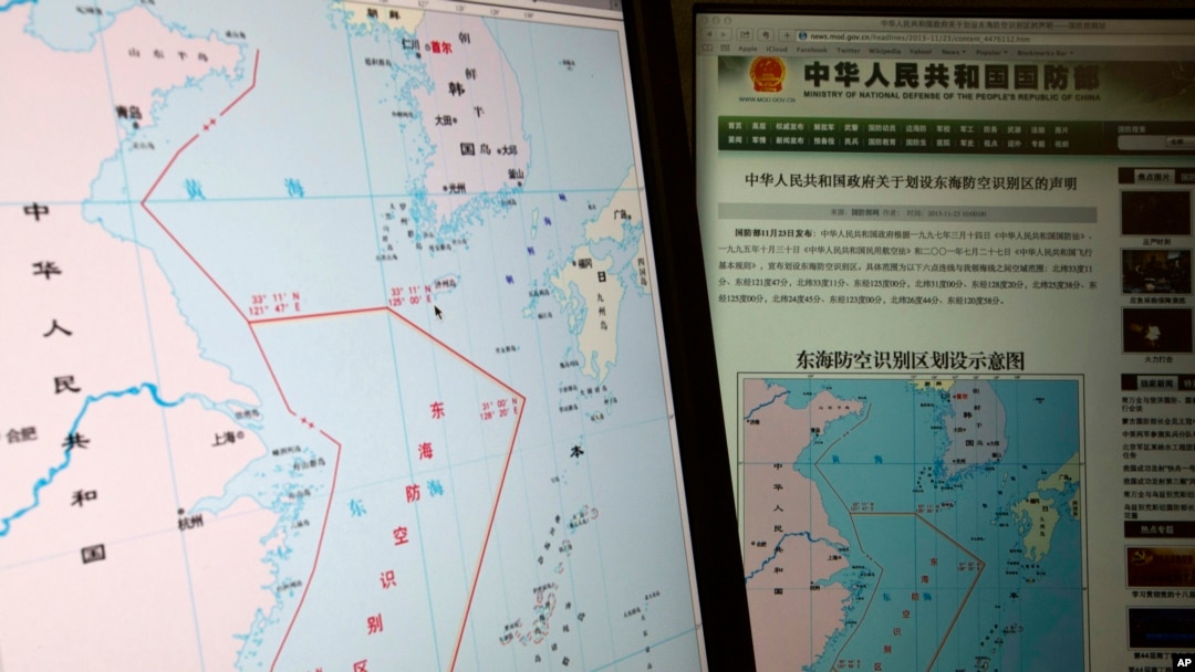 Computer screens display map showing outline of China's new air defense zone in the East China Sea, website of Chinese Ministry of Defense, Beijing, Nov. 26, 2013.