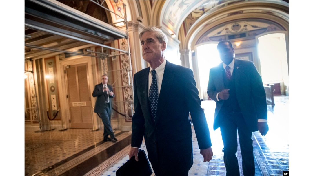 FILE - Special Counsel Robert Mueller departs after a closed-door meeting with members of the Senate Judiciary Committee about Russian meddling in the election and possible connection to the Trump campaign, at the Capitol in Washington, June 21, 2017.