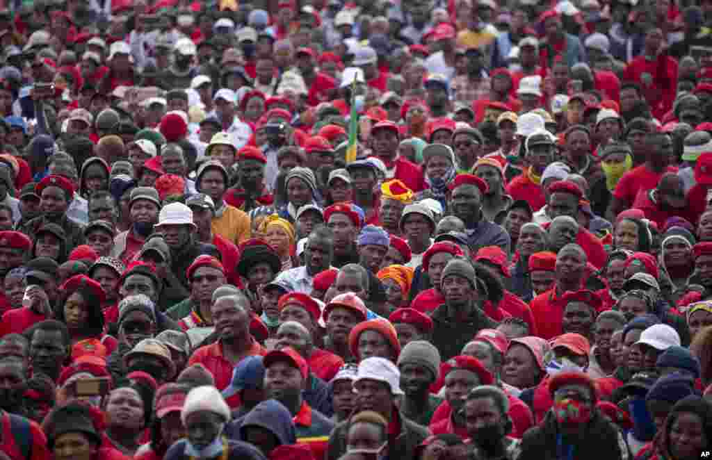 Supporters of the Economic Freedom Fighters listen to their leader Julius Malema, during an election rally in Katlehong township, east of Johannesburg, Oct. 29, 2021.