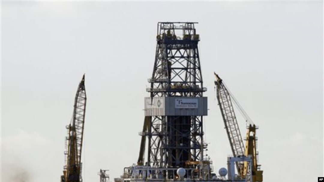 The Transocean Development Driller III is seen on the surface above the Deepwater Horizon oil wellhead on the Gulf of Mexico near the coast of Louisiana, 16 Jul 2010