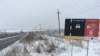 Дорога к КПВВ "Гнутово" перед поселком Пищевик