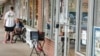 Belle View Shopping Center in Alexandria, Va., with mostly privately owned small businesses. Many stores are closing or have limited their hours because of the coronavirus. (Deborah Block/VOA)
