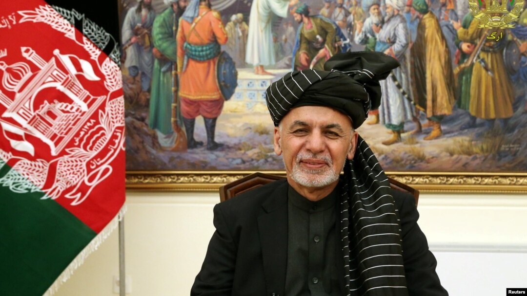 Afghanistan's President Ashraf Ghani speaks during a live TV broadcast at the presidential palace in Kabul, Afghanistan, Jan. 28, 2019. 