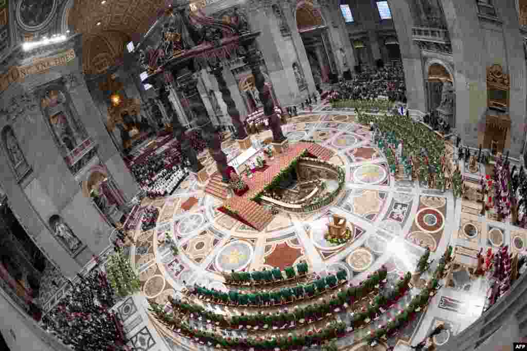 Pope Francis celebrates a closing Mass at the end of the Synod of Bishops in St. Peter&#39;s Basilica at the Vatican.