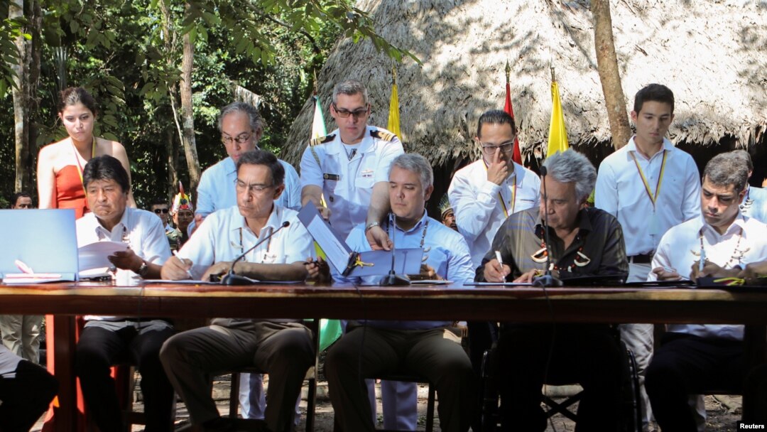 Bolivia's Evo Morales, Peru's Martin Vizcarra, Colombia's Ivan Duque, Ecuador's Lenin Moreno, all Presidents , and Suriname VP Michael Ashwin Adhin sign a Amazon pact, Sept. 6, 2019.