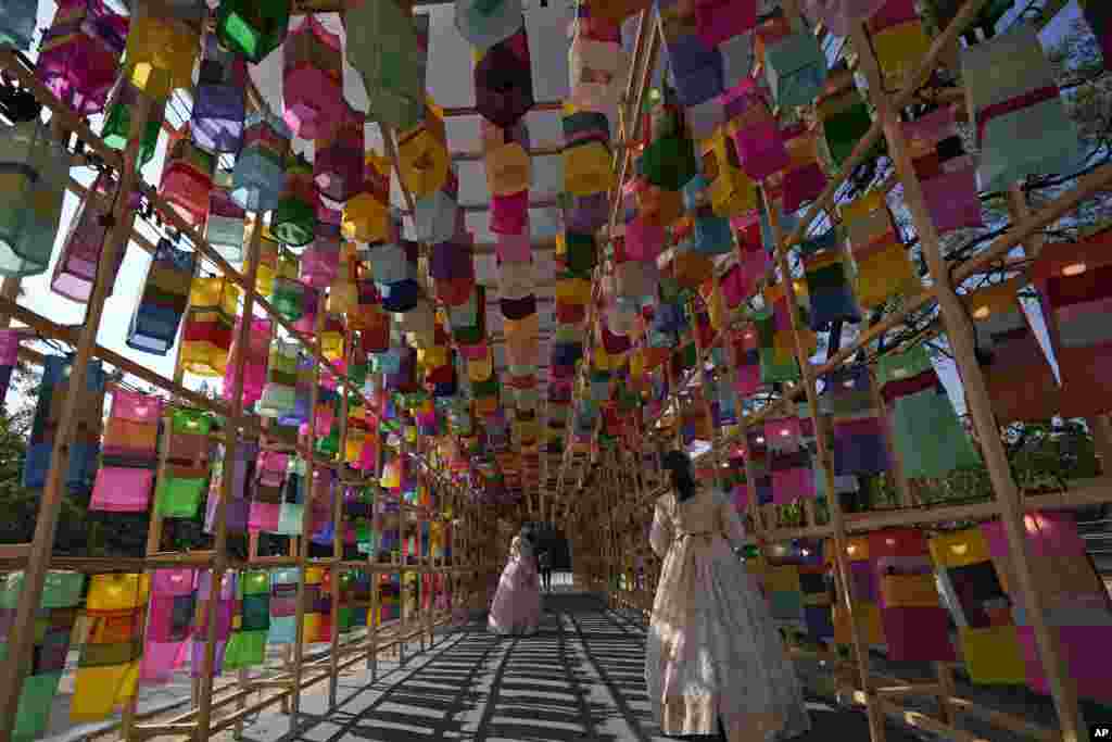 Visitors walk through the lanterns at the Royal Culture Festival at the Gyeongbok Palace, one of South Korea's well-known landmarks, in Seoul.