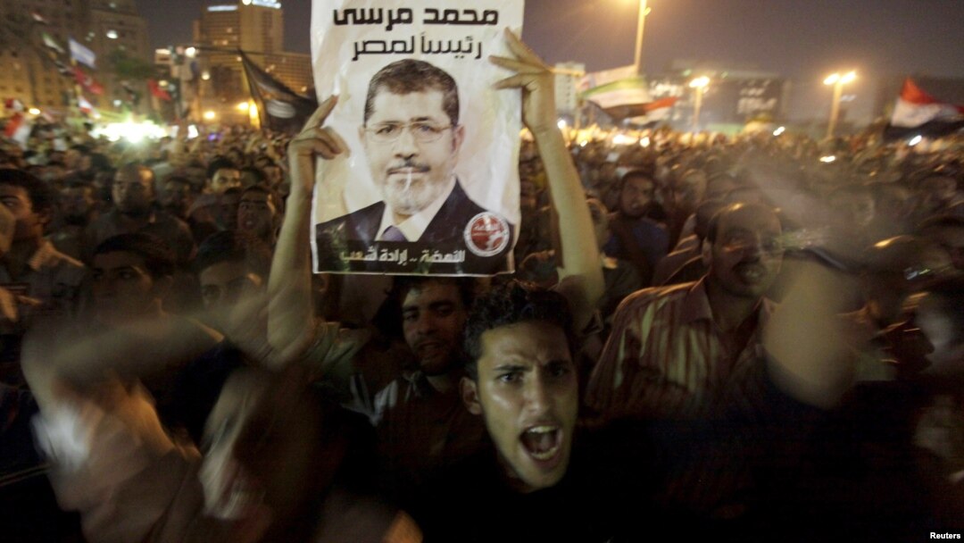 Supporter of President Morsi during celebration of his dismissal of former defense ministers, Tahrir Square, Cairo, Aug. 13, 2012.