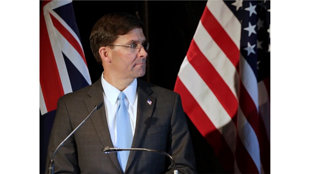 FILE - U.S. Secretary of Defense Mark Esper briefs the media following annual bilateral talks with Australian counterparts in Sydney, Australia, Aug. 4, 2019.